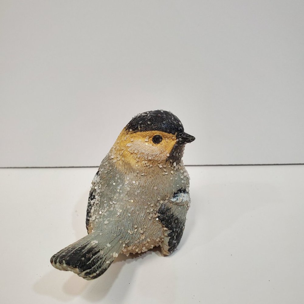 Snow Covered Sparrow